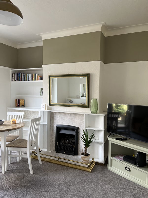 Photo 1: Shared living room