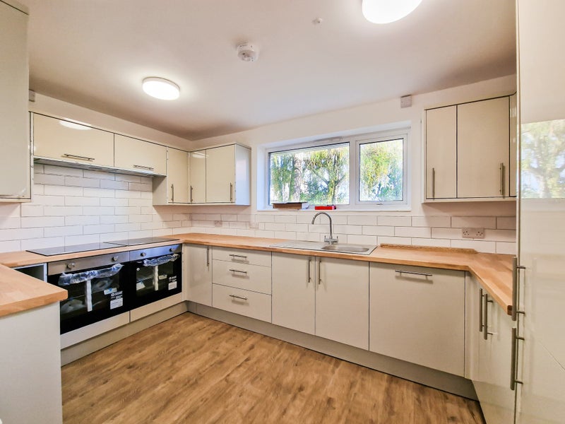 Photo 1: Kitchen
