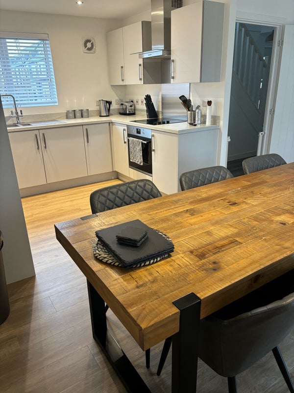 Photo 1: Kitchen/open plan downstsirs 