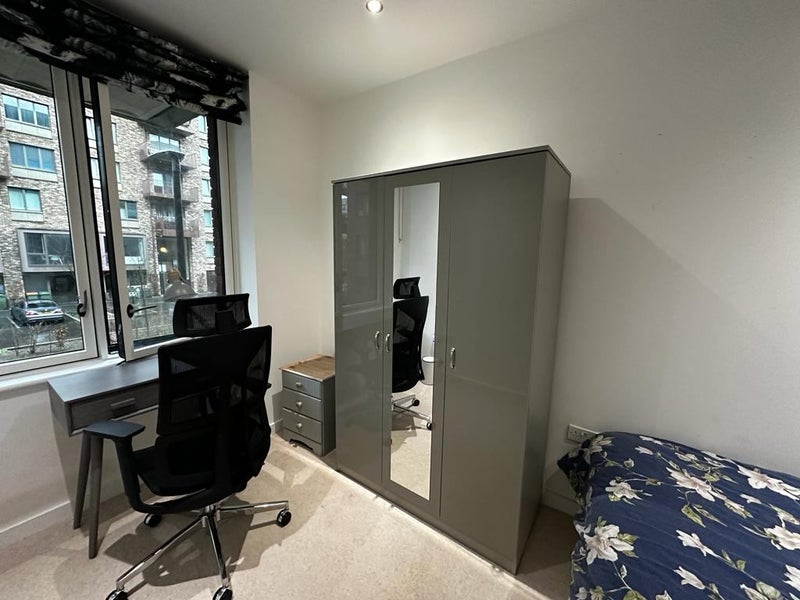 Photo 1: Room View with Amenities