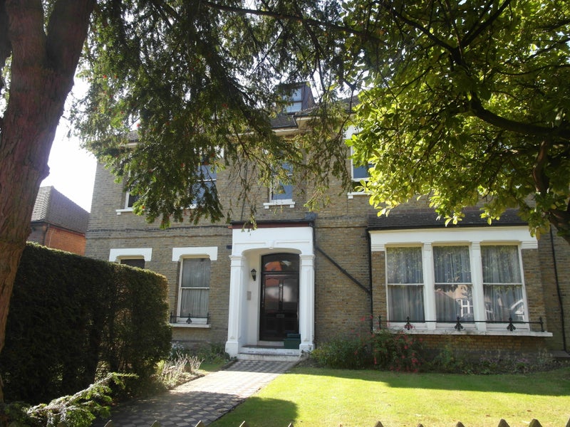 Photo 1: Front of building