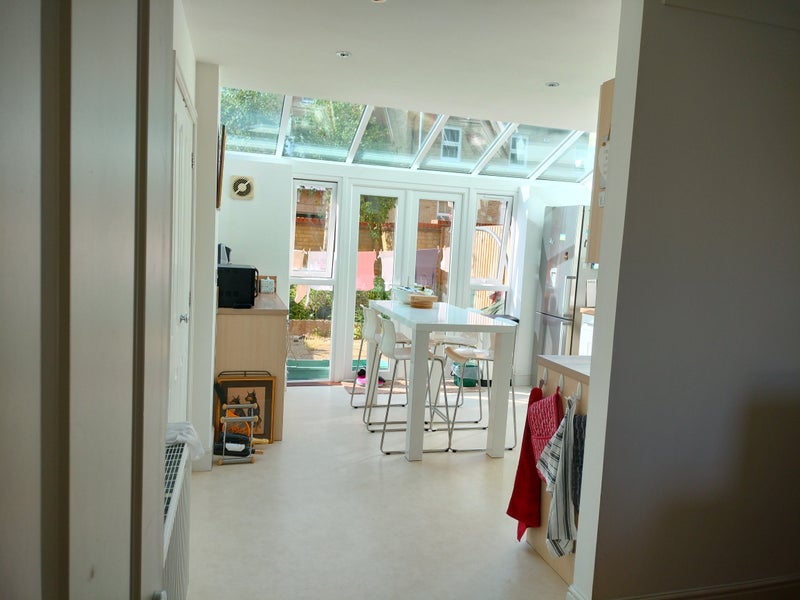 Photo 1: Kitchen from the dining room