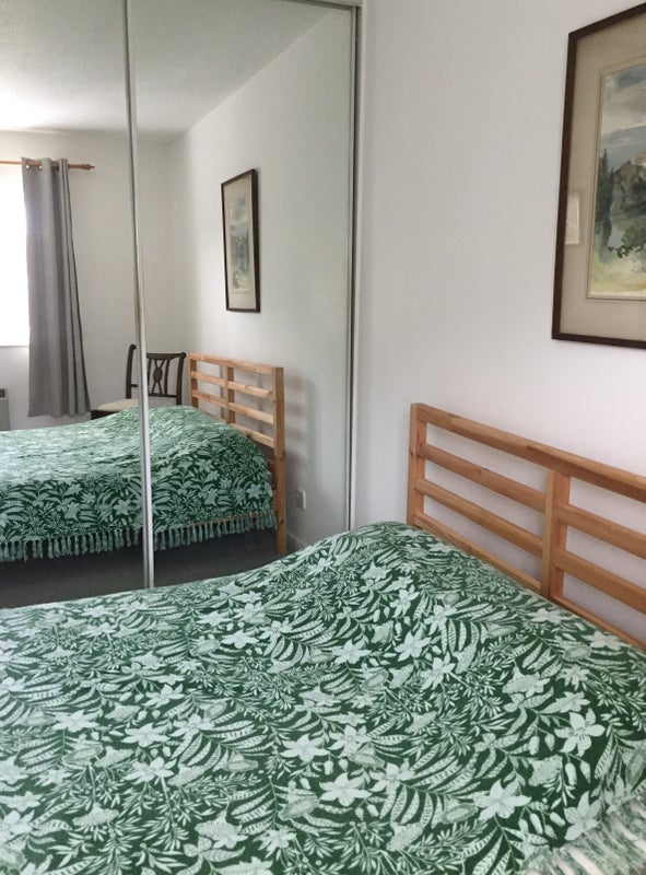 Photo 1: Double bedroom with large double mirrored wardrobe