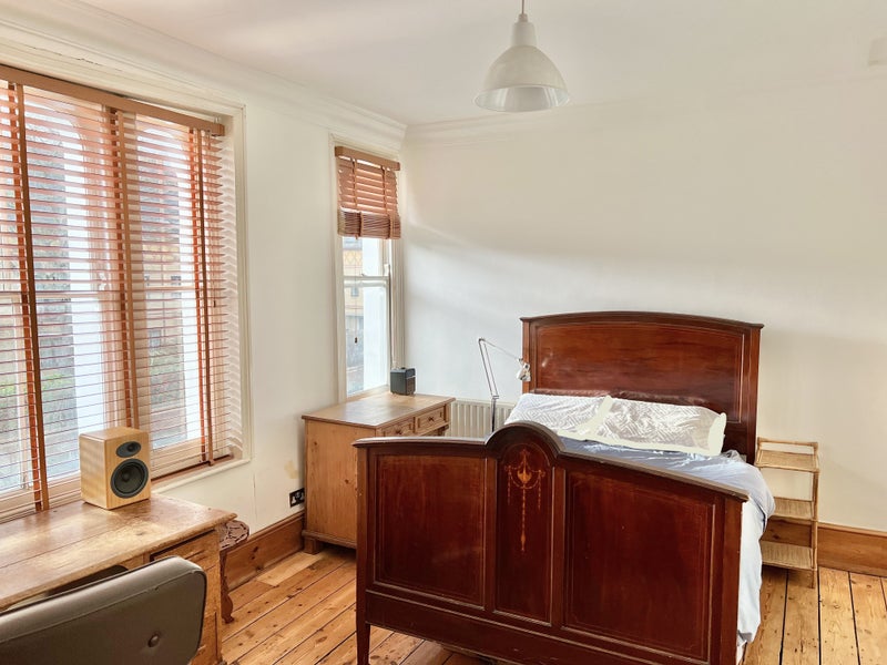 Photo 1: Main bedroom with brand-new mattress, cupboard, desk, director chair. 