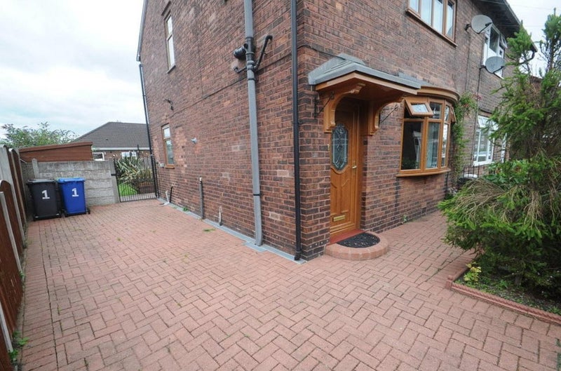 Photo 1: Front exterior. 