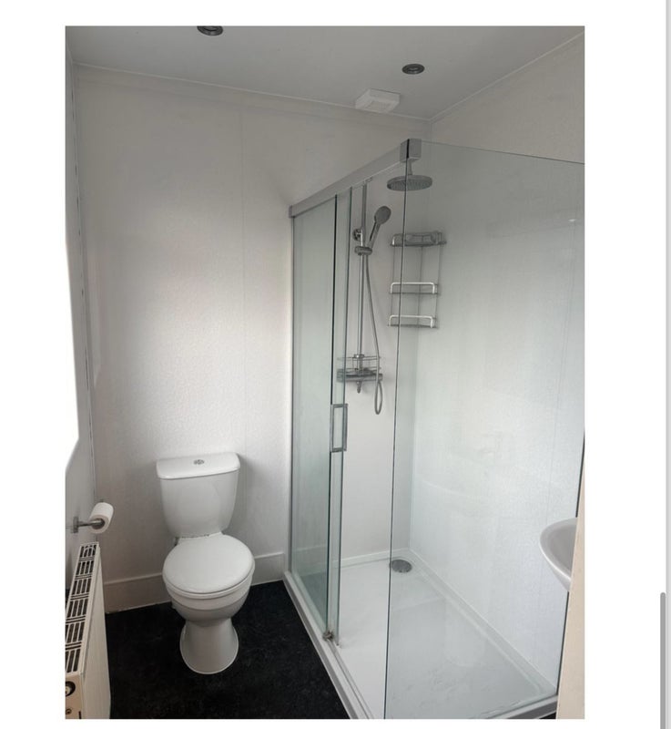 Photo 1: Ensuite shower, sink and toilet