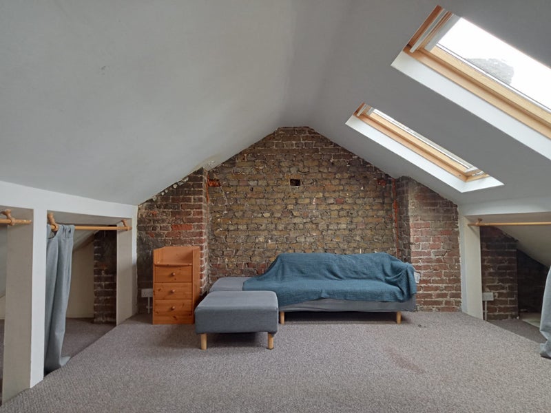 Photo 1: Attic room