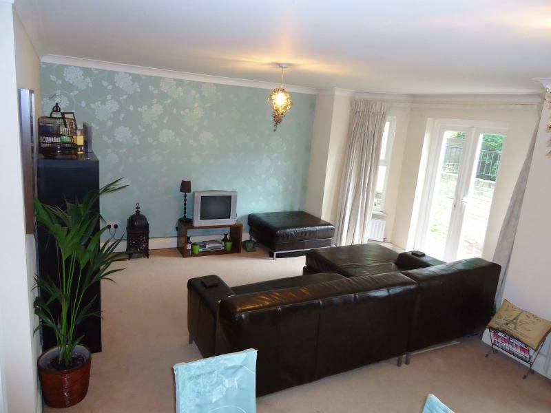 Photo 1: Living and dining room