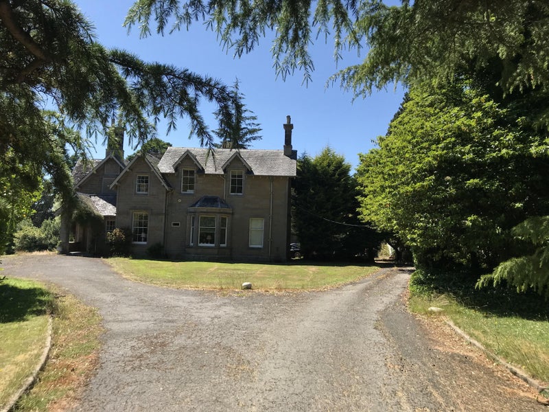 Photo 1: Front of house