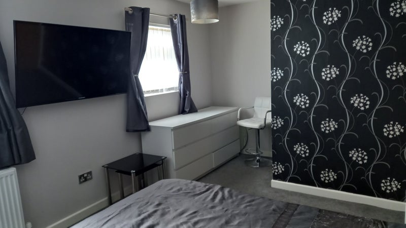 Photo 1: Double bedroom with large TV.kingsize bed & plenty of storage.