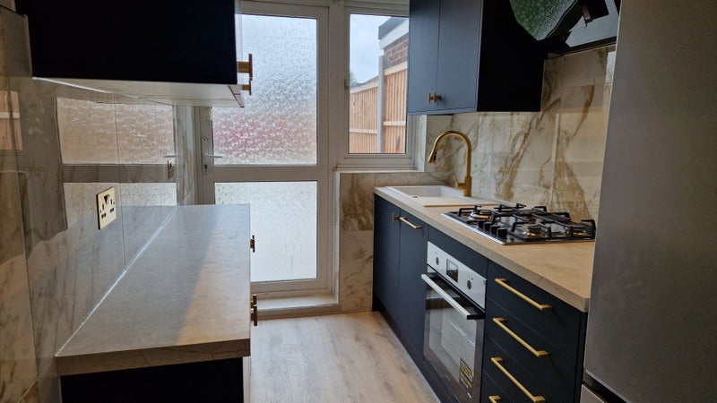 Photo 1: Kitchen