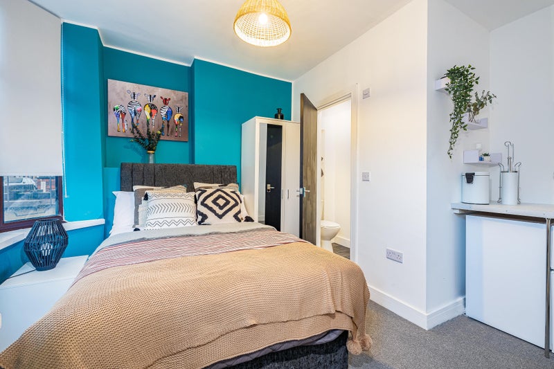 Photo 1: Bedroom 1- available room 