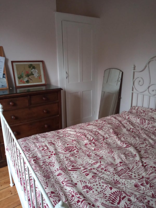 Photo 1: view of room with double bed