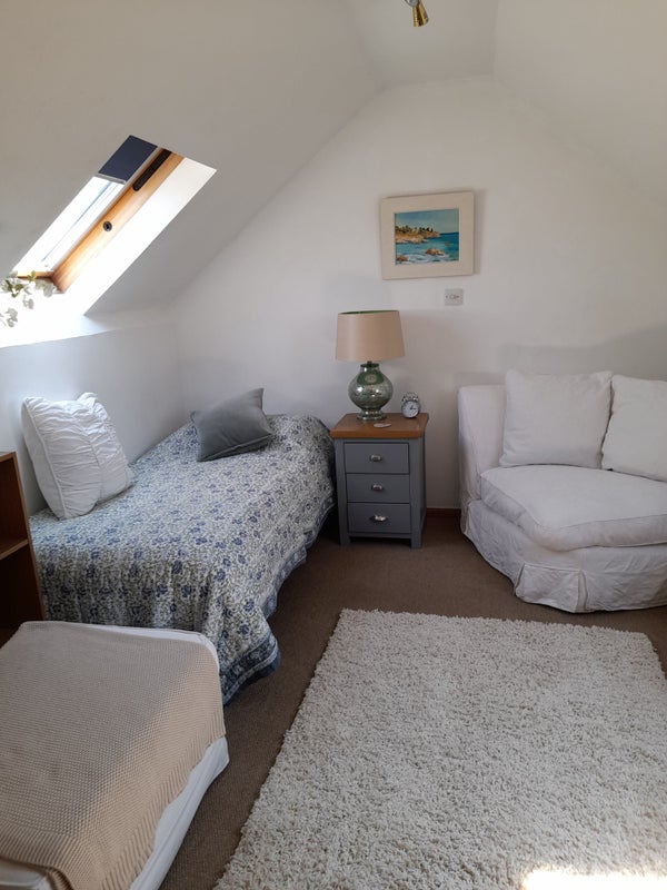 Photo 1: Sunny attic room