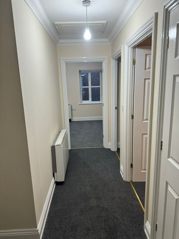Photo 2: Entrance to hall way