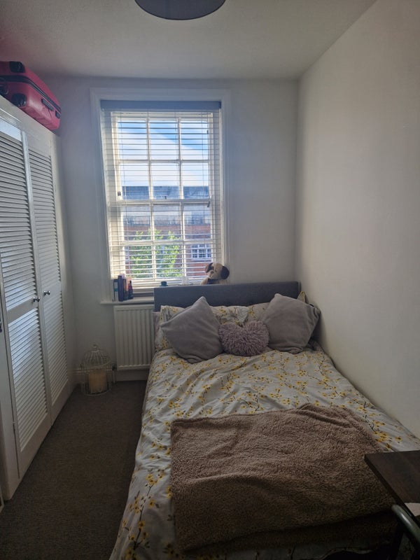 Photo 1: Bedroom overlooking sainsburys, costa and flour pot cafe- perfect location with busses 2mim from hou