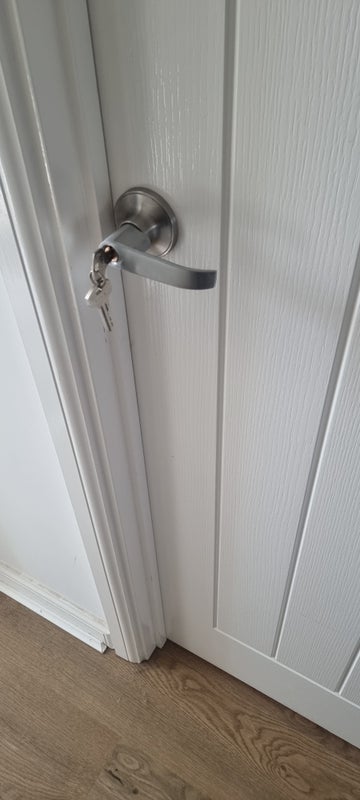 Photo 1: Door lock with key