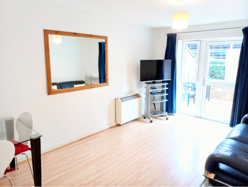 Photo 1: Living room, leading to private garden is gated/cctv