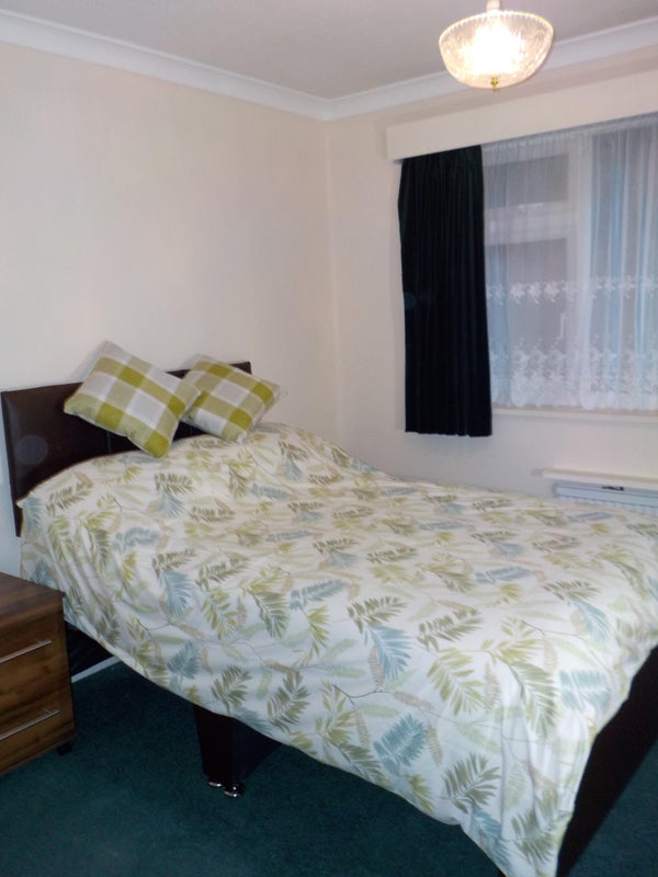 Photo 1: ROOM WITH IN-BUILT CABINETS AND WARDROBE