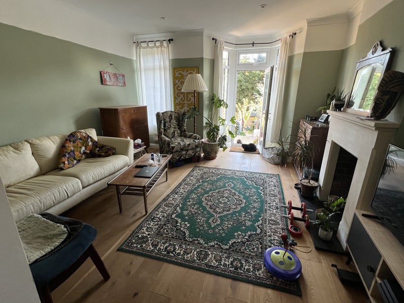 Photo 1: Shared living room