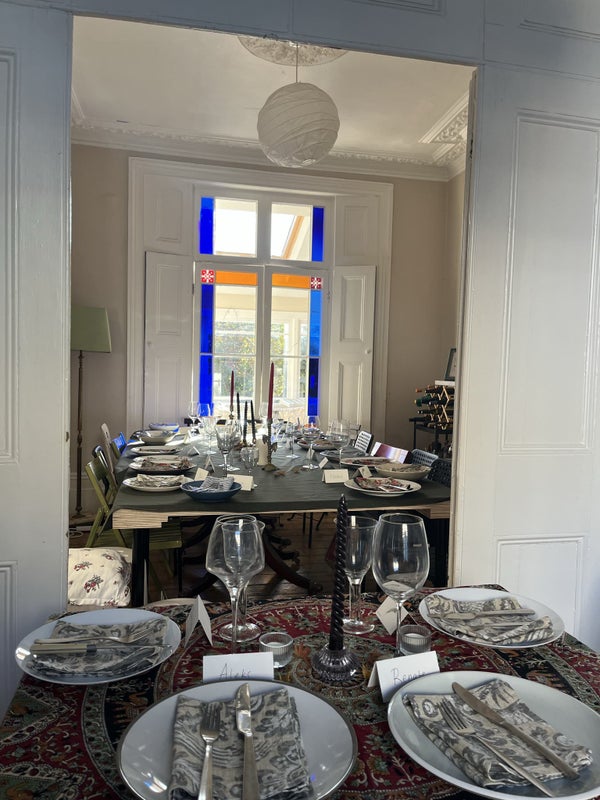 Photo 1: Last year’s Thanksgiving dinner in the living spaces