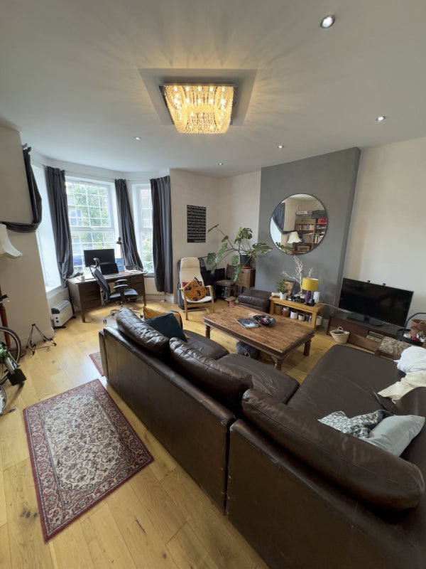 Photo 1: communal living room