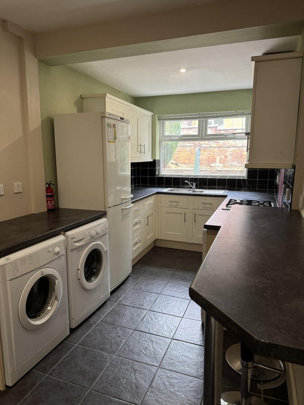 Photo 1: Kitchen