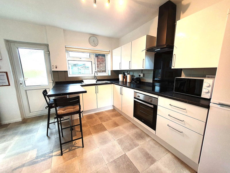 Photo 1: Kitchen