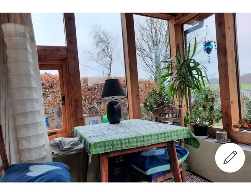 Photo 1: Sunroom/dining room/sitting room