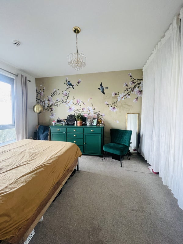 Photo 1: View from the bedroom door, the wardrobes are hidden behind the curtain