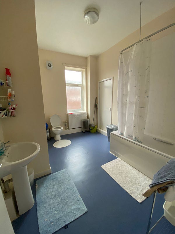Photo 1: Shared bathroom