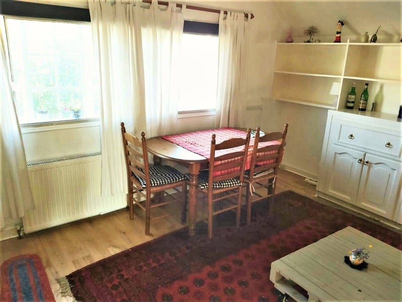 Photo 2: The bedroom with bed folded away.