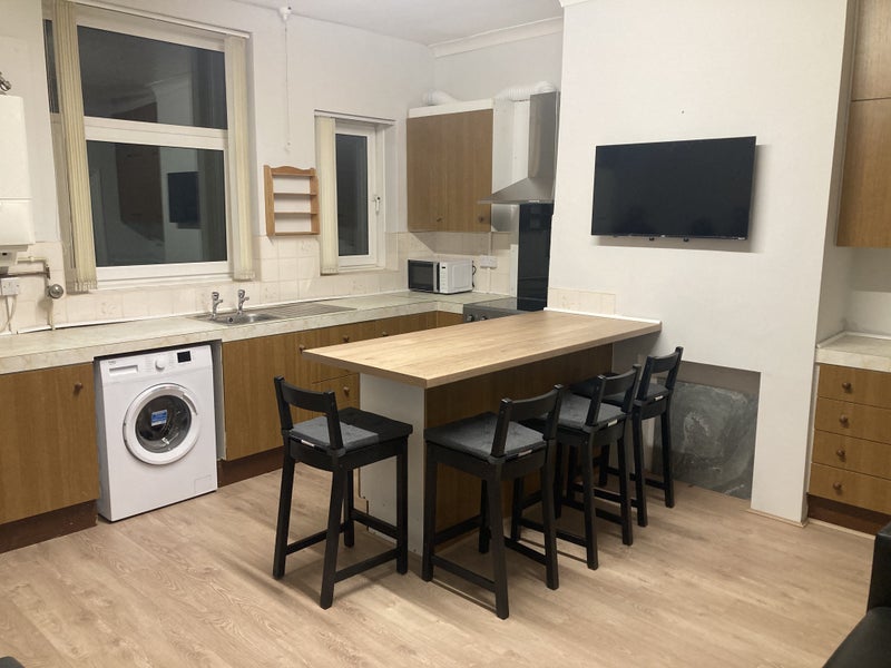 Photo 1: Shared living kitchen