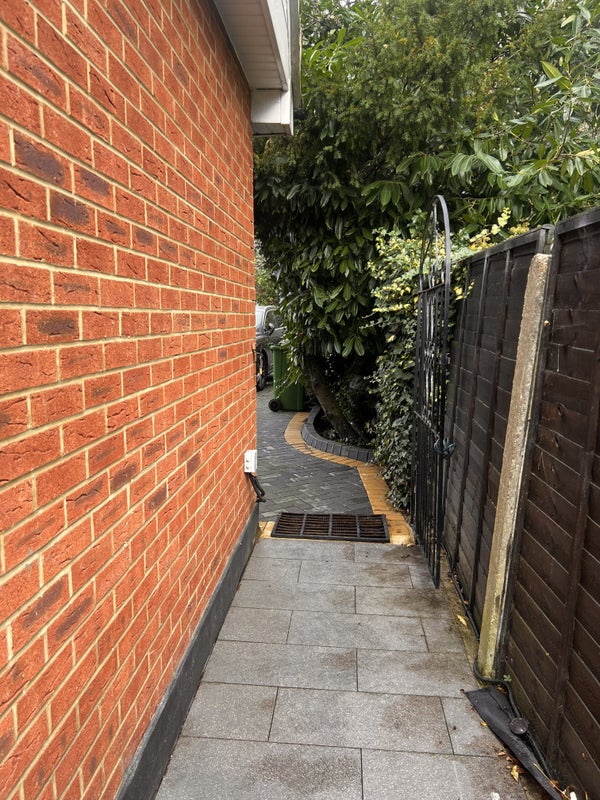 Photo 1: Side entrance