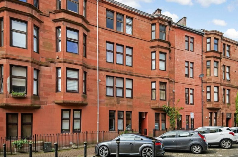 Photo 1: Front of building