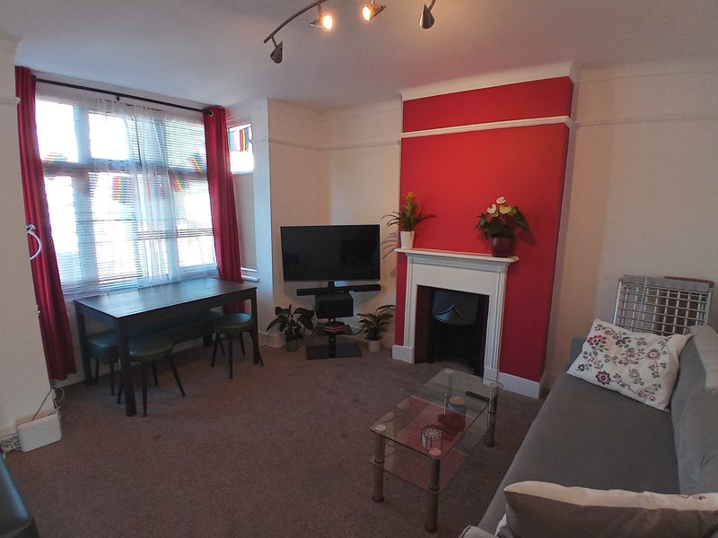 Photo 1: shared living room 