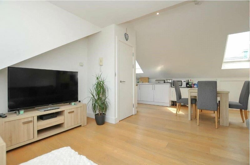 Photo 1: Shared living space