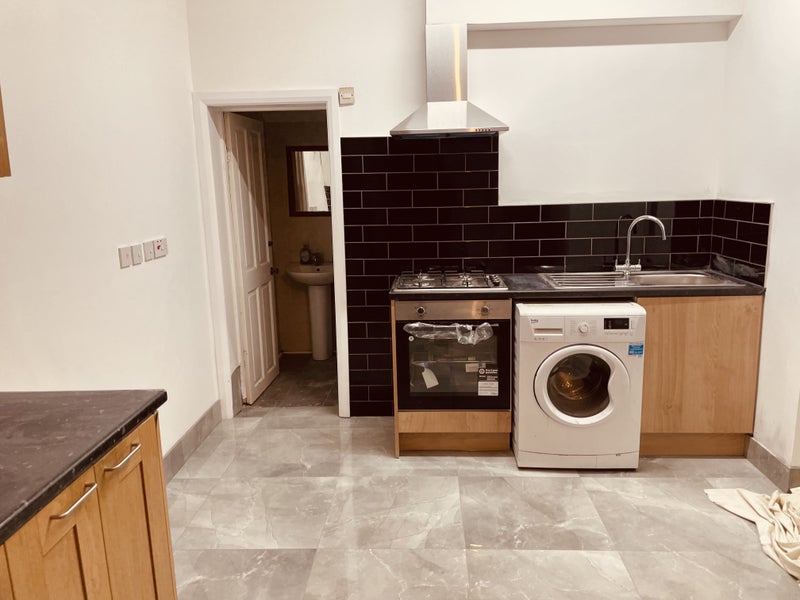Photo 1: Kitchen