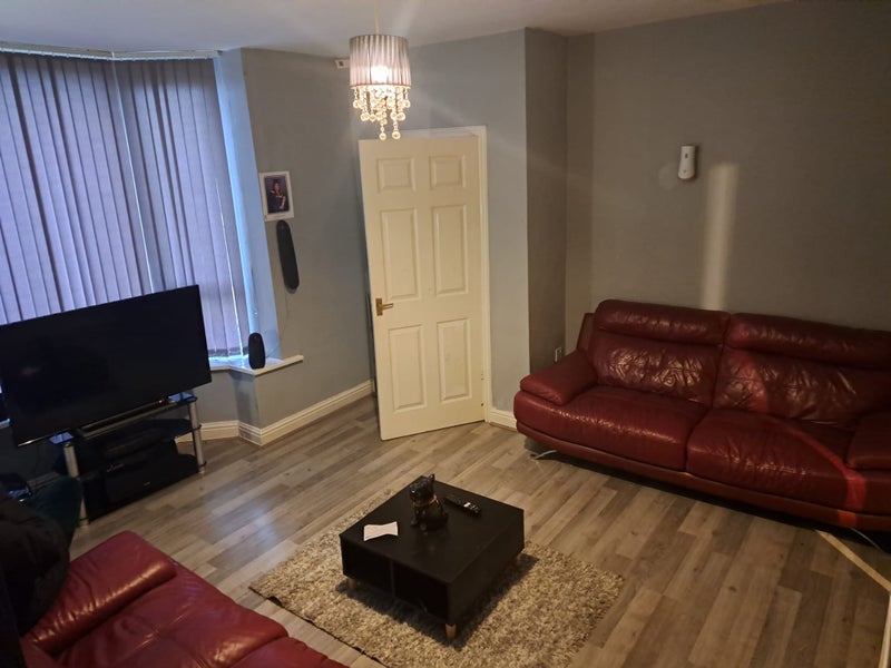 Photo 1: Shared living room