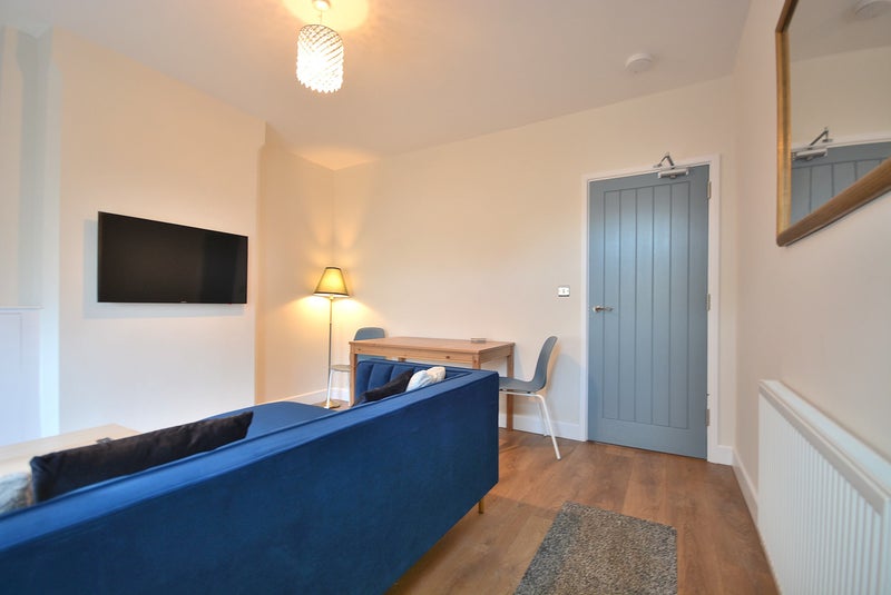 Photo 1: Communal Living Space