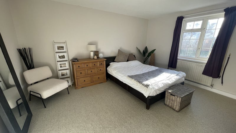 Photo 1: Wide angle makes bed look small, but it's a kingsize!