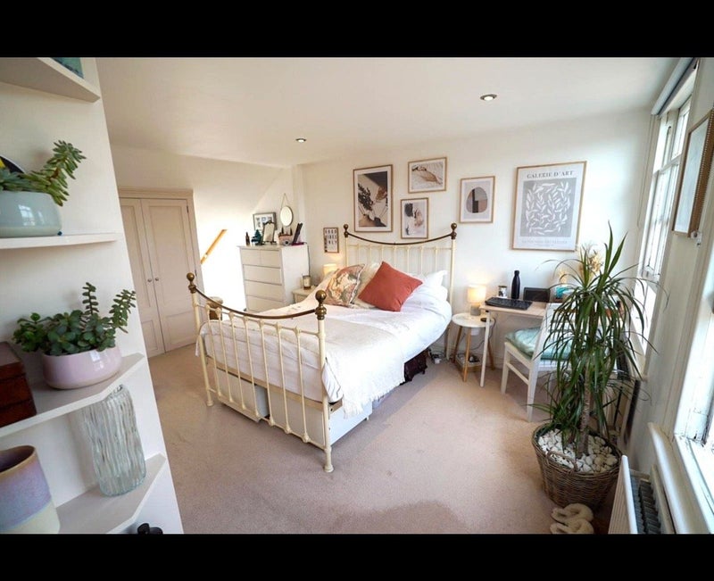 Photo 1: The availabile bedroom, does not come with the desk and chest of drawers