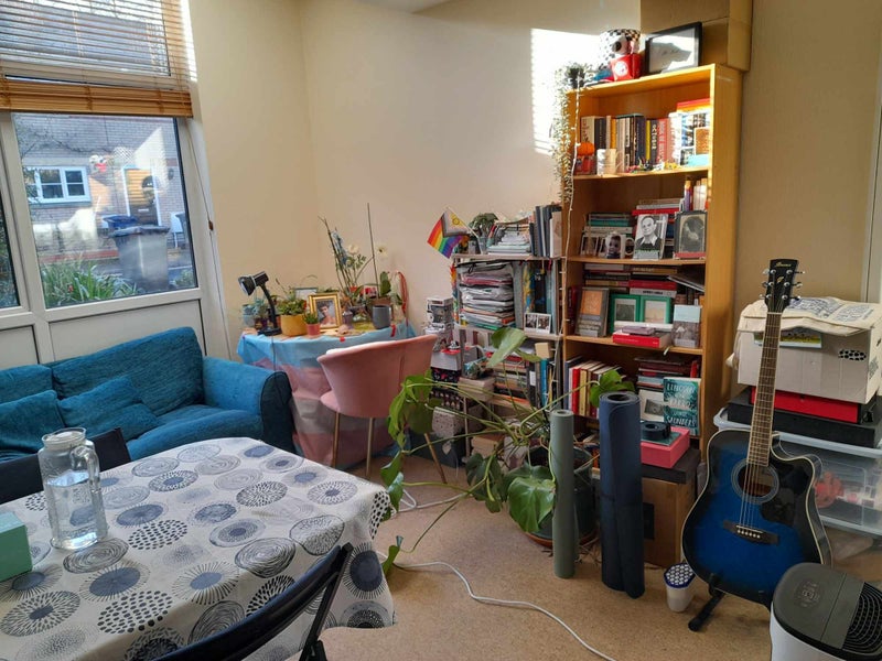 Photo 1: This is "my side" of the living room.