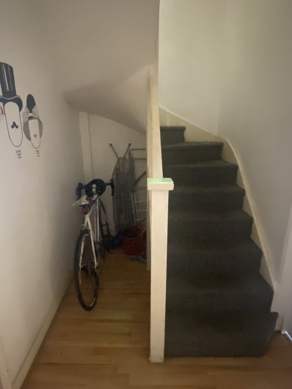 Photo 9: bike space near the stairs inside the flat