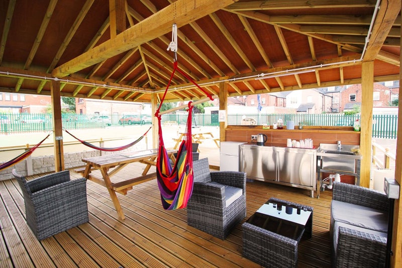 Photo 1: PAGODA next to sports field