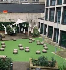 Photo 7: Courtyard/designated smoking area
