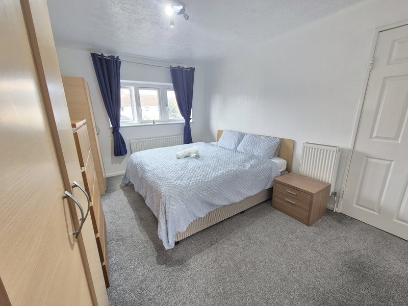 Photo 1: Very large double room with super kingsize bed, two wardrobes, and chests of drawers
