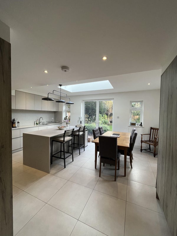 Photo 1: Kitchen and dining area