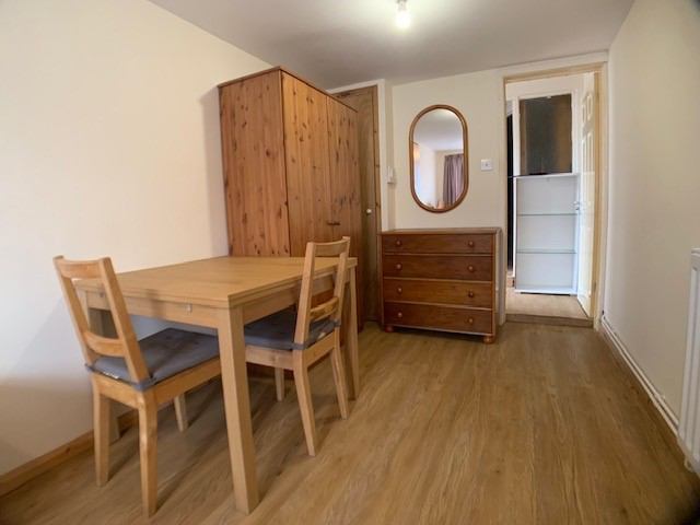 Photo 1: Storage & sitting area within bedroom