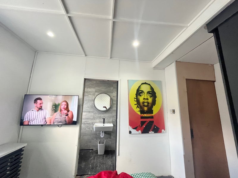 Photo 3: Bedroom with TV, access to en-suite 